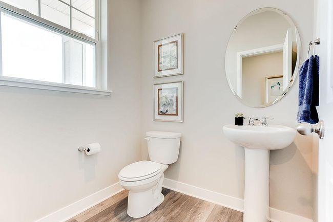 Main floor half bath for guests. Photo of model home, color & options will vary. | Image 10