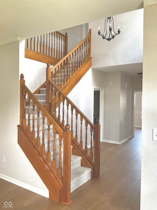 Open and bright two story foyer (new carpet, flooring and paint) | Image 6
