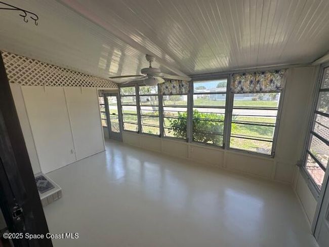freshly painted sunroom | Image 20