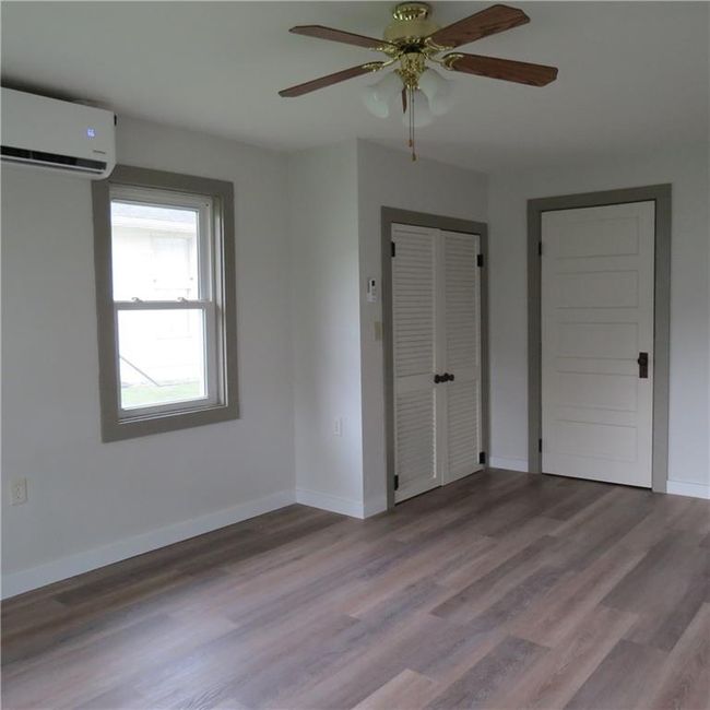 closet and bathroom entry in primary bedroom | Image 19