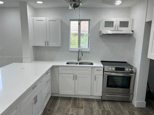 a-261 Nw 49th St, Miami, FL, 33127-2142 | Card Image