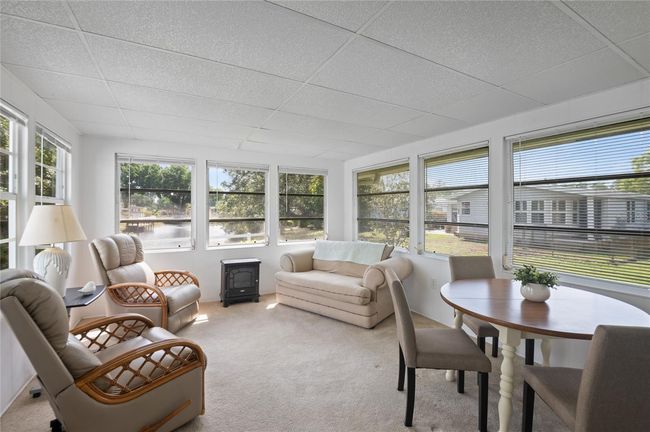 Lanai with electric fireplace | Image 14