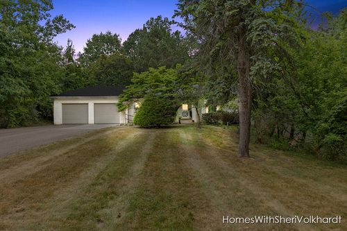 303 4 Mile Rd Nw, Comstock Park, MI, 49321-8515 | Card Image