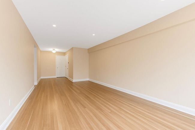 Spare room with light wood finished floors and recessed lighting | Image 13