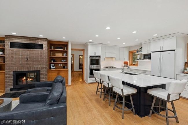 Recently updated kitchen with amazing island and plenty of cabinets. | Image 18