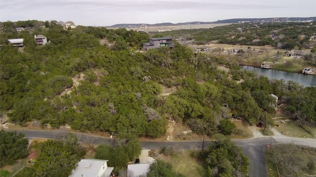 Aerial view of property and surrounding area featuring a large body of water | Image 10