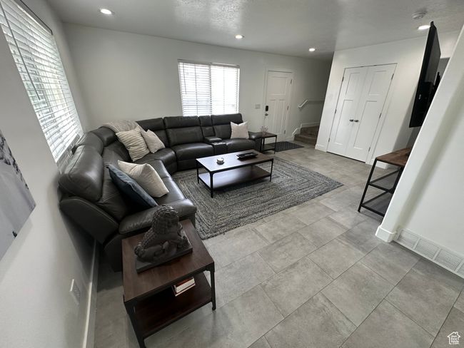 Living room featuring recessed lighting and baseboards | Image 19