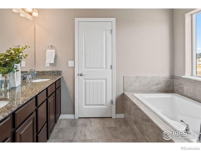 1410 Larimer Ridge Pkwy, House other with 3 bedrooms, 3 bathrooms and 3 parking in Timnath CO | Image 32