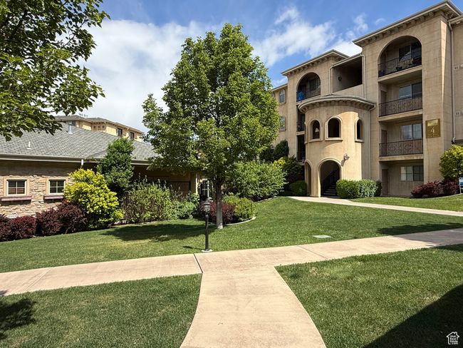 View of home's community with a yard | Image 22