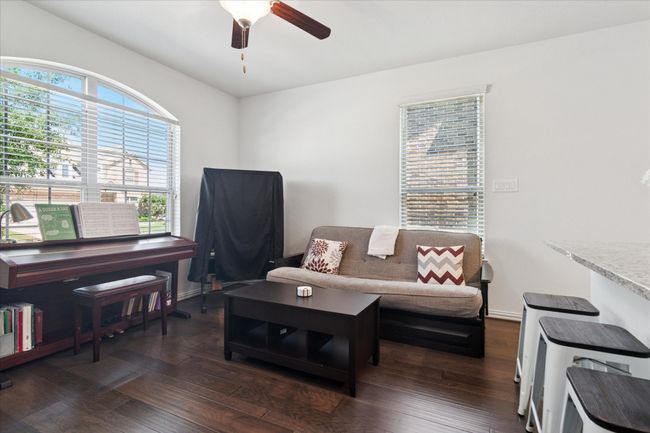 The separate living quarters provide a comfortable retreat with a spacious bedroom, full bath, cozy living area, convenient kitchenette, and in-unit laundry closet, ensuring independence while remaining connected under one roof. | Image 24