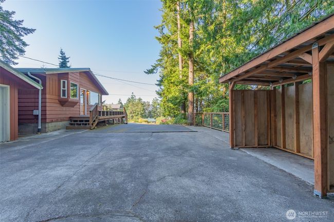 Long drive with plenty of room for parking along with large 2 car garage | Image 23