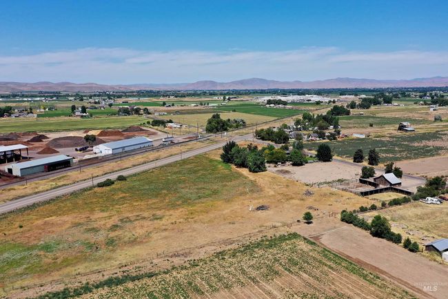 Overview of rural landscape with a mountain backdrop | Image 46