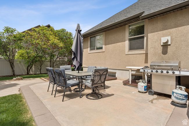 View of patio / terrace featuring area for grilling and outdoor dining space | Image 37