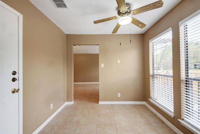 Natural light fills the space in the dining area | Image 12