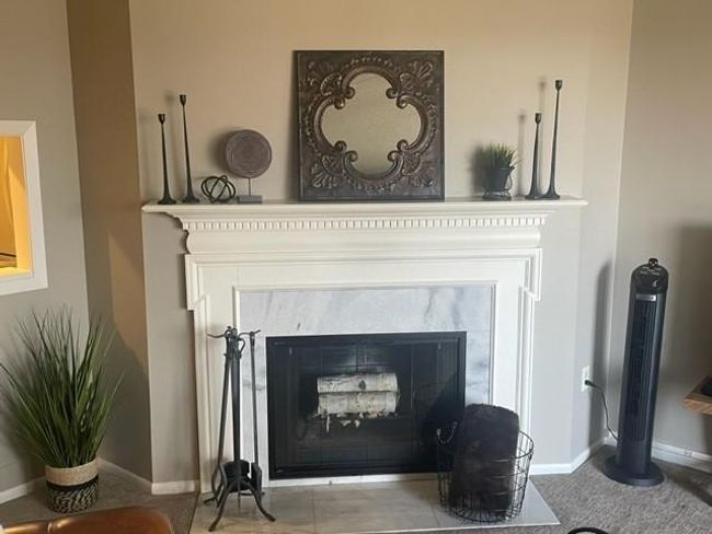 cozy, wood burning fireplace. | Image 9