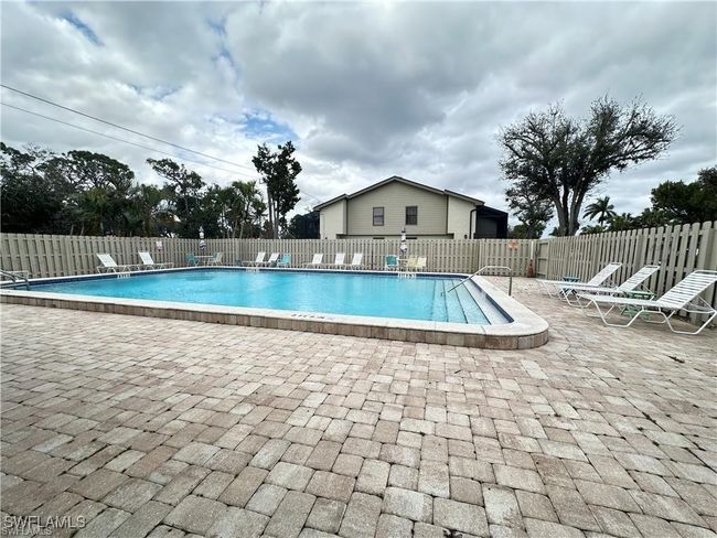 Community pool featuring a patio area | Image 29