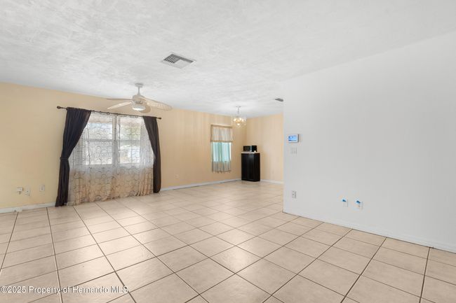 7464 Acorn Cir, House other with 3 bedrooms, 2 bathrooms and null parking in SPRING HILL FL | Image 6