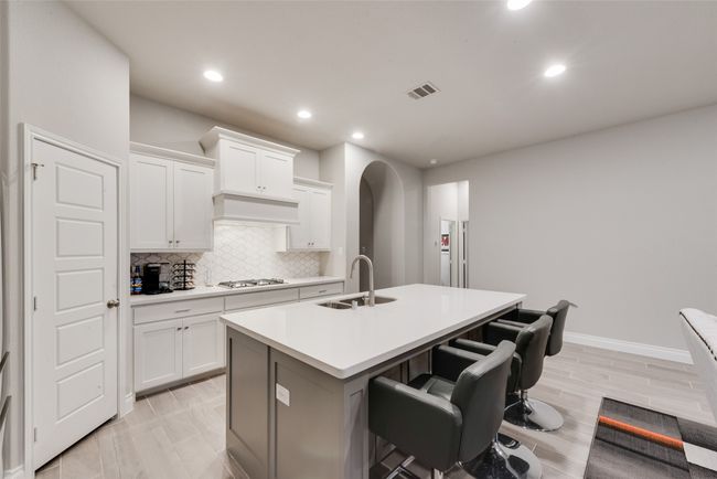 Light and bright kitchen with large seated island | Image 7