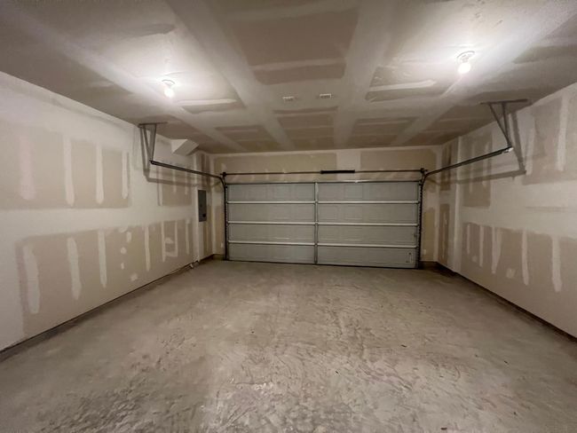 Garage with electric panel | Image 11