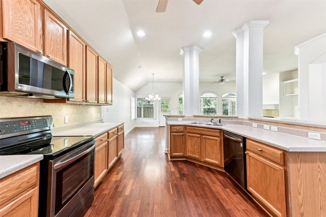 Another view of large kitchen ready for your dinner plans | Image 18