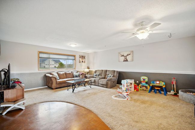 Lower level family room has good space and fun concrete floor. Basement has in-floor heat! | Image 22