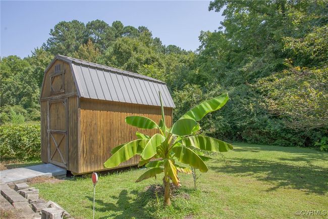 View of outdoor shed featuring a lawn | Image 44
