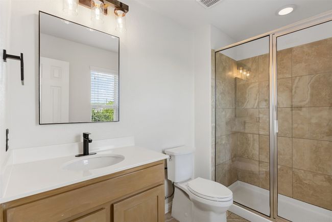 Full bathroom featuring vanity and a shower stall | Image 19