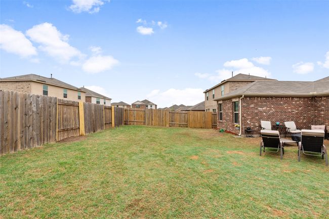 View of yard with a fenced backyard | Image 30