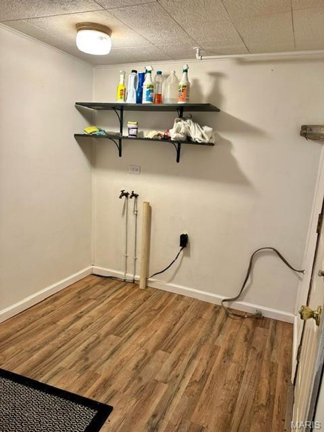 Laundry area with washer hookup and wood-type flooring | Image 31