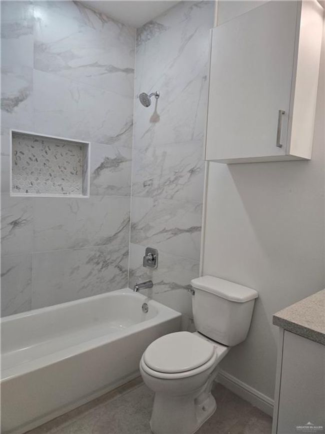 Full bath featuring vanity and shower combination | Image 13