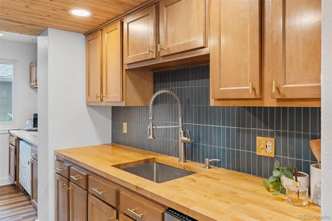 Kitchen with SS appliances, new hardware and backsplash | Image 5