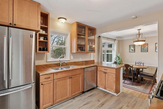 Lovely kitchen with granite counters and stainless appliances | Image 9