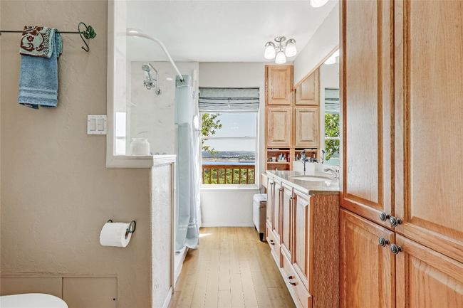 Great cabinet space, bamboo floor, oversized separate shower, dual vanity. | Image 27