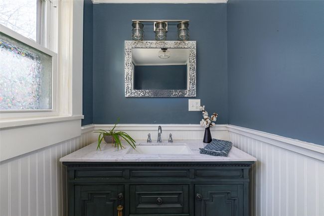 Bathroom featuring vanity | Image 9
