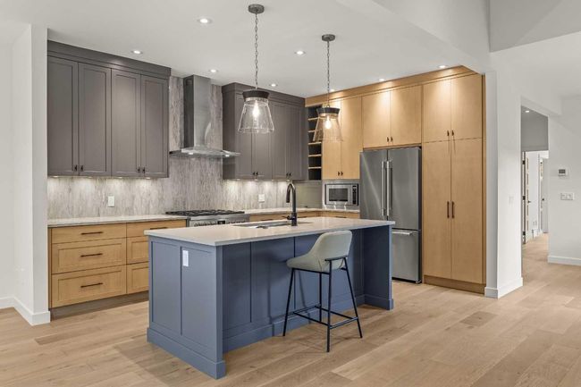 249A Three Sisters Drive, Home with 4 bedrooms, 4 bathrooms and 4 parking in Canmore AB | Image 11