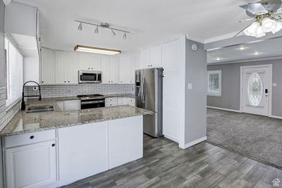 5066 W 5360 S, House other with 4 bedrooms, 2 bathrooms and 8 parking in Salt Lake City UT | Image 3