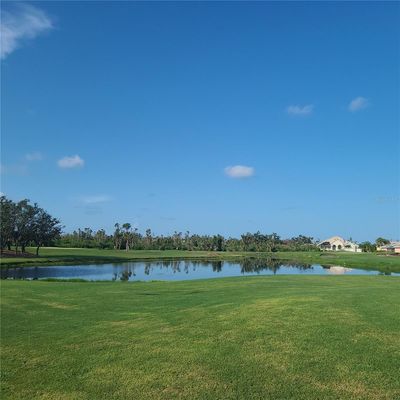 What a pretty view of the lake and golf course! | Image 2