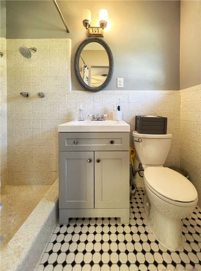 UPDATED MASTER BATH WITH LARGE WALK-IN SHOWER AND TILE FLOORS | Image 15