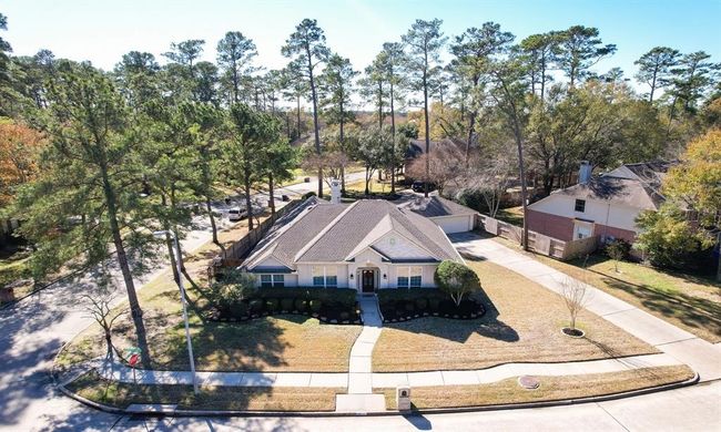 Home management is eased with abundant cabinet and closet storage, security system, low maintenance brick exterior a two car garage. | Image 40