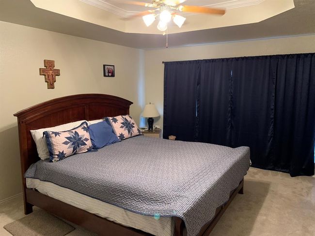 King size bed and all furniture easily fit in the space. | Image 17