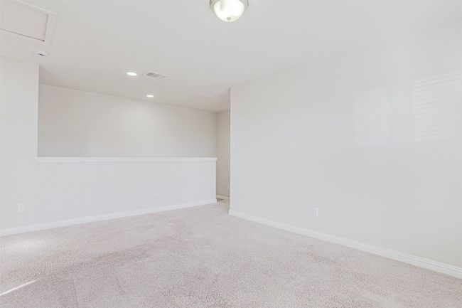 Carpeted spare room with baseboards and recessed lighting | Image 29
