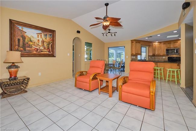 Family Room with Pocket Sliding Glass Doors to the Lanai/Pool. | Image 13