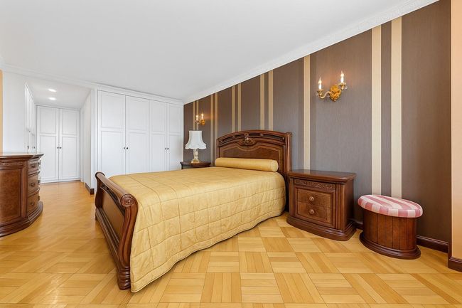 Bedroom with crown molding, a closet, and recessed lighting | Image 19