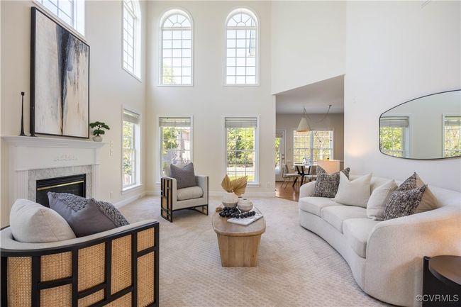 ...and rounding out the flow from the Foyer is a two level Family Room that is brimming with sunshine and space! It's stunning! | Image 8