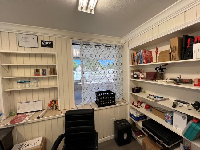 Office area featuring ornamental molding | Image 33