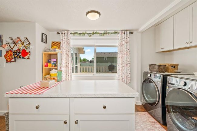Kitchen looking out toward porch and yard | Image 17