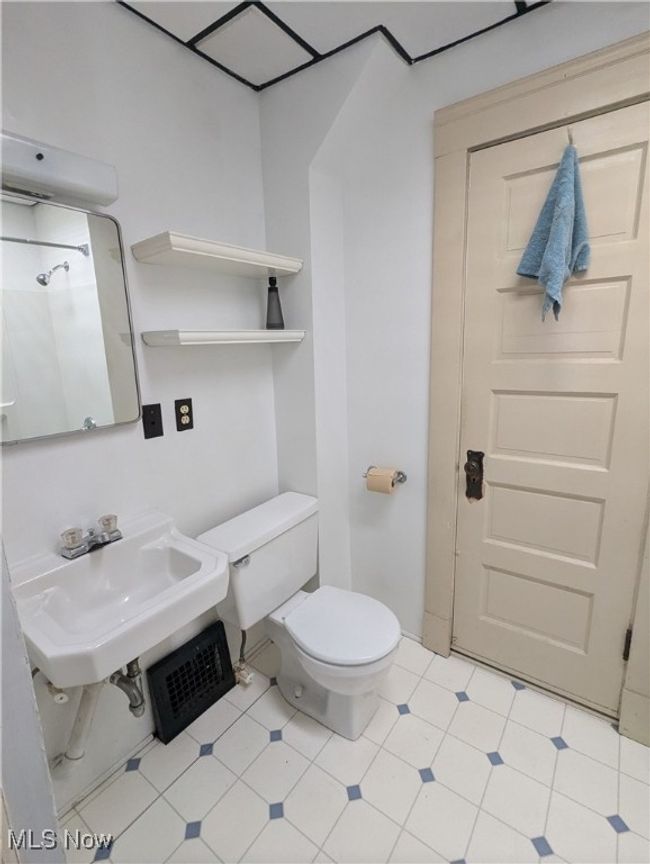 First-Floor Bathroom with toilet and sink | Image 15