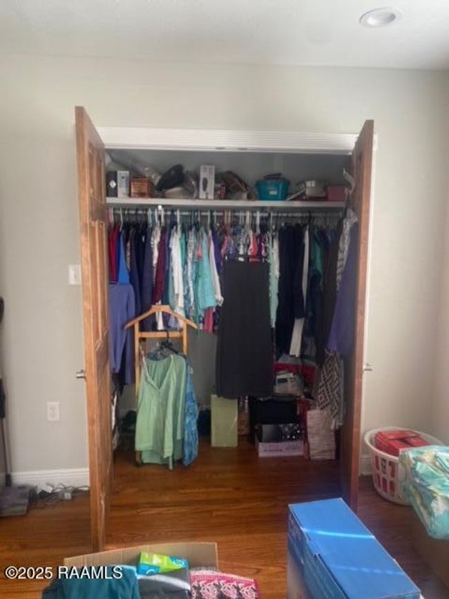 404 A large closet - premiere bedroom | Image 6