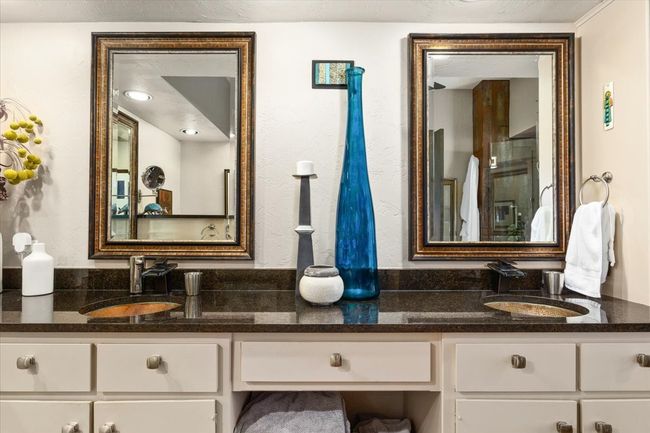Bathroom with dual copper sinks and granite countertops | Image 29