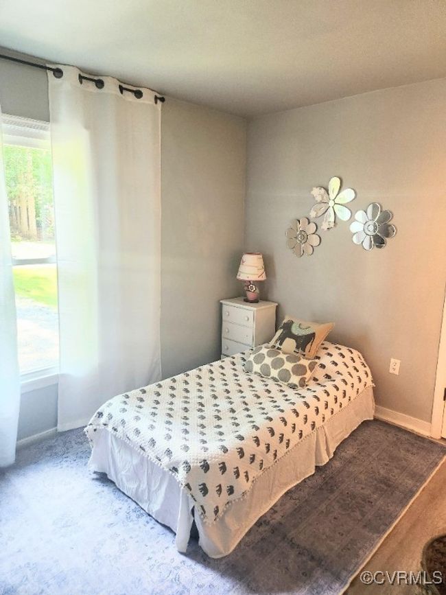 Bedroom featuring baseboards | Image 14